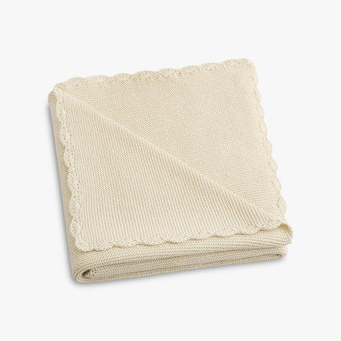 Cotton Knit Baby Blanket in Ivory folded to show trim detail
