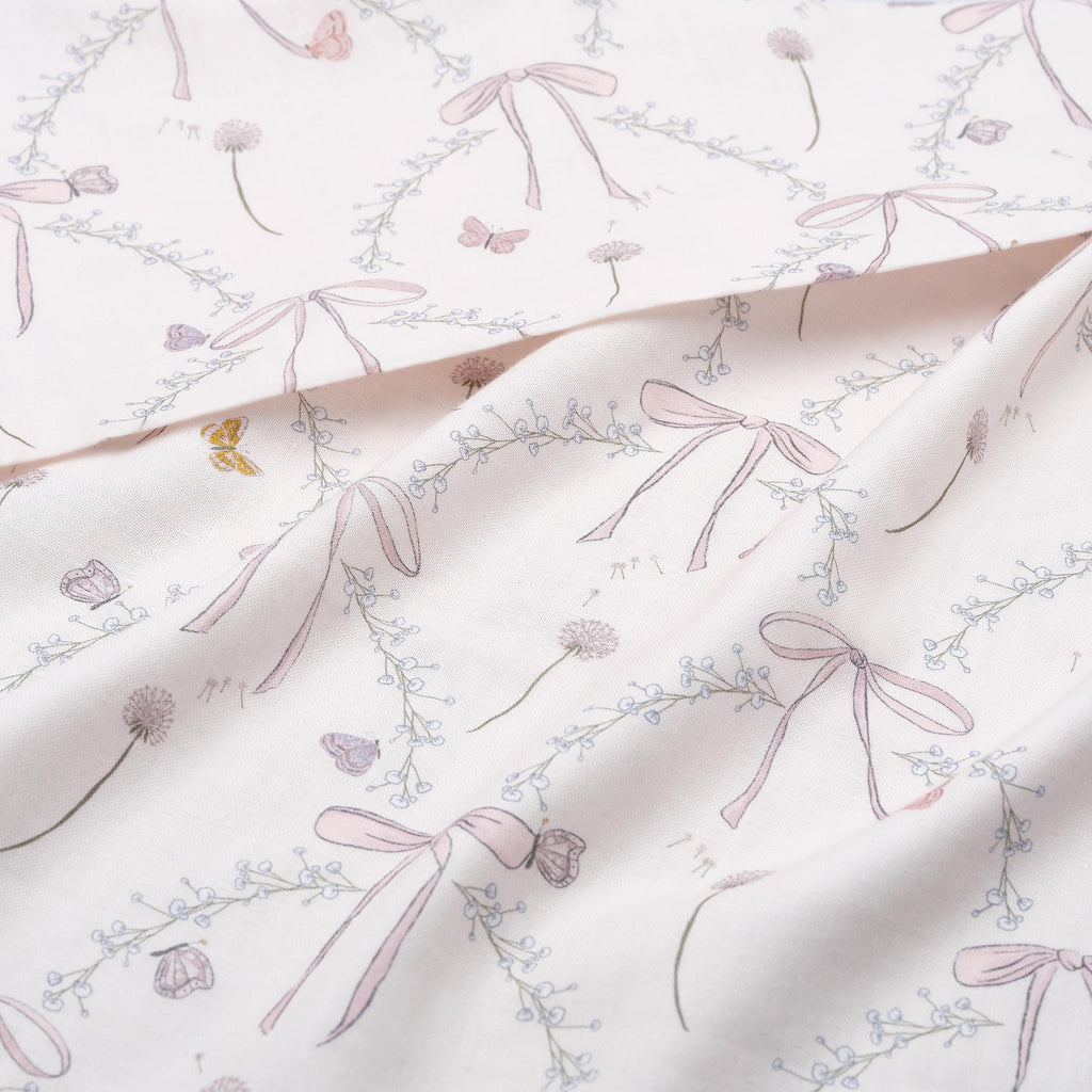 Bows & Butterfly Kisses Swaddle Blanket in Pink.