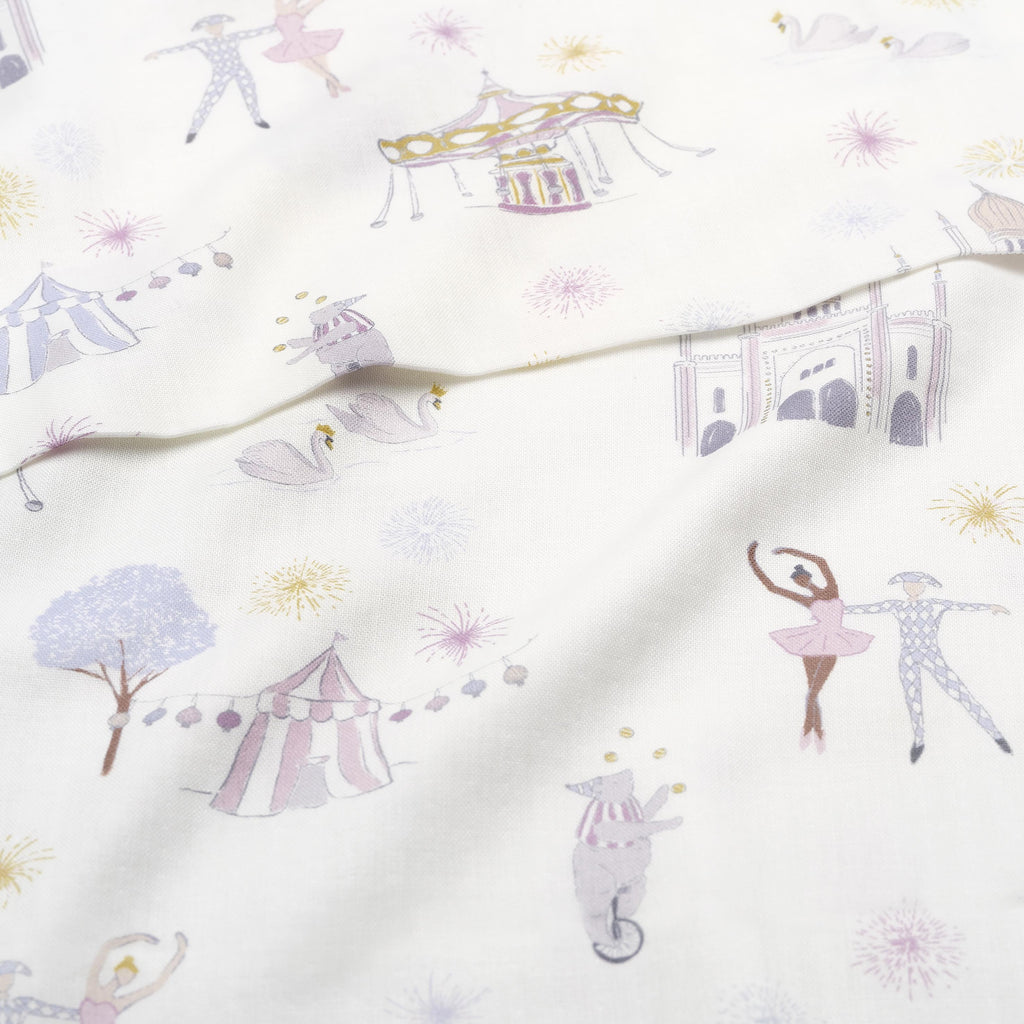 Adventures in Wonderland Swaddle Blanket in Rose.