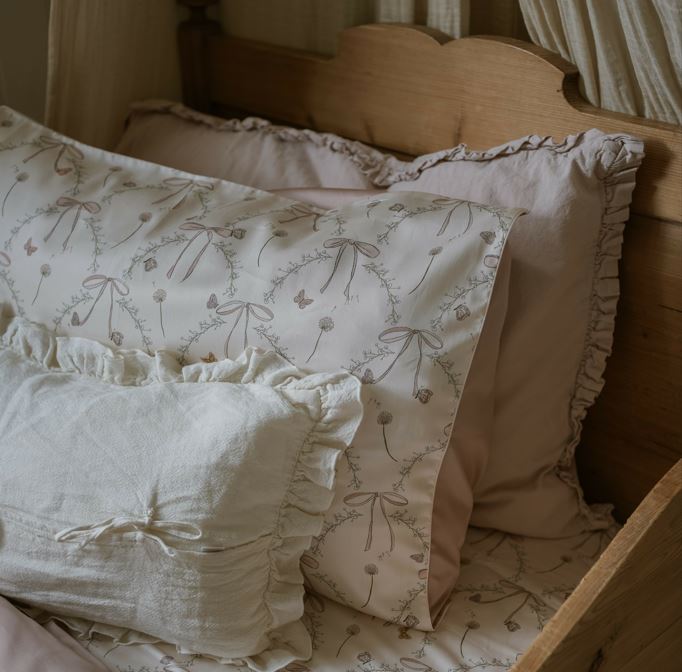 Standard Pillow of the Bow Print in a Twin BEd