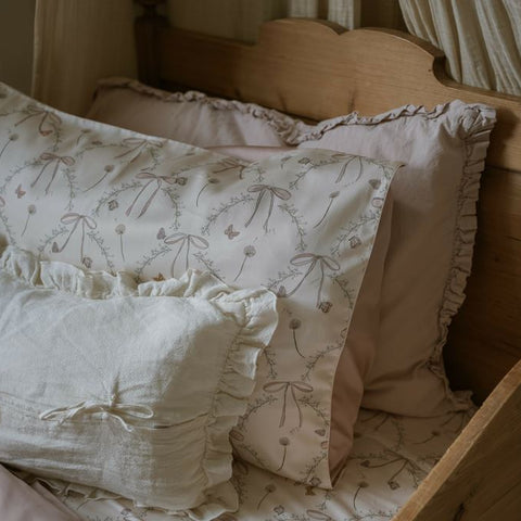 Standard Pillow of the Bow Print in a Twin BEd