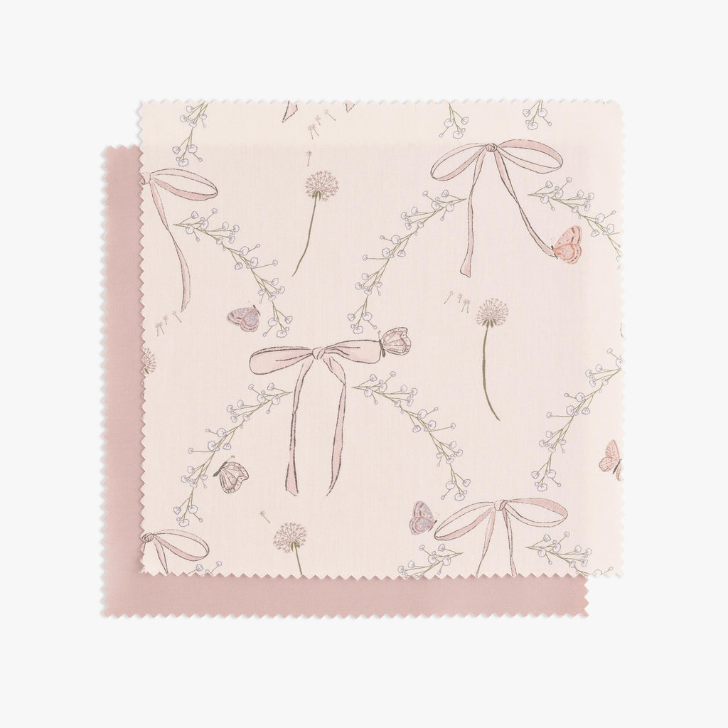 "Bows & Butterfly Kisses" print in Pink swatch with backside in solid Pink